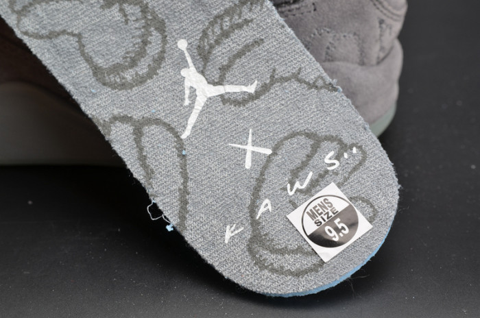 kaws x air jordan 4 “cool grey” 930155-003